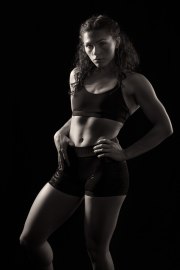 Gabrielle striking a pose in a fitness portrait session