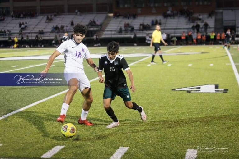 East Henderson Soccer Upsets North Henderson